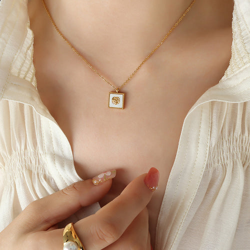 Gold white shell camellia square pendant necklace worn on collarbone