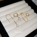 Gold Pearl Stud and Hoop Earring Four Piece Set with Polished Metal Details view 2