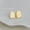 Gold Bezel Cream Enamel Shell Inlay Irregular Oval Studs view 1