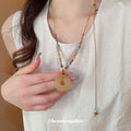 Honey Jade Bi Disc Gray Amber Bead Gold Cord Necklace view 3