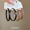 Slim Leather Hoop Earrings in Black and Brown with Polished Details view 2