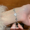 Silver Heart CZ Pull Adjustable Bracelet Shell Center view 3