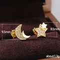 Gold Tone Asymmetric Crescent Moon And Star Stud Earrings view 5