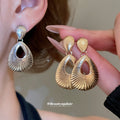 Ridged Open Teardrop Clip On Earrings in Silver with Polished Details view 2