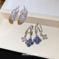 Silver Tone Feather and Blue Flower Stud Earrings Jewelry Pair view 1