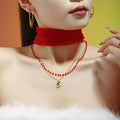 Double Layer Garnet Christmas Hat Necklace and Bracelet in Gold Tone view 2