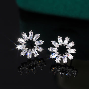 Silver Tone Snowflake Stud Earrings With Clear Stones