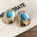 Blue Oval Resin Stud Earrings in Gold and Silver Tones view 6