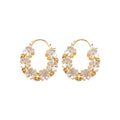 White Flower and Crystal Hoop Earrings in Polished Gold Tone view 5