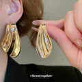 Gold Tone Asymmetric Fishtail Stud Earrings Statement Jewelry view 4