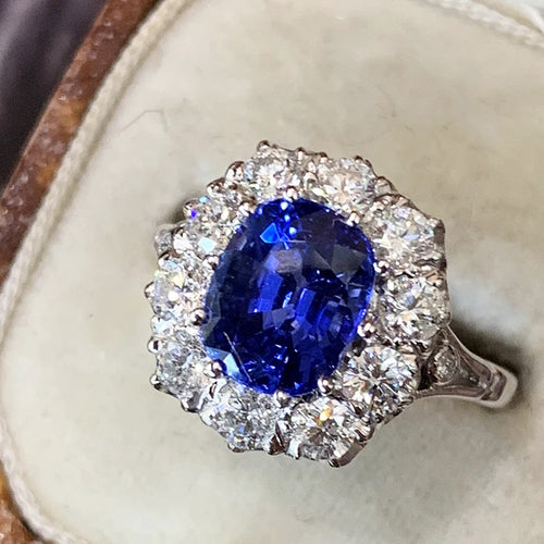 Second product view showing oversized silver-tone oval halo cluster ring