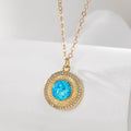 Gold Tone Blue Opal Effect Evil Eye and Hamsa Pendant Necklaces view 3