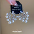 Silver Tone Crystal and Pearl Look Chandelier Earrings view 2