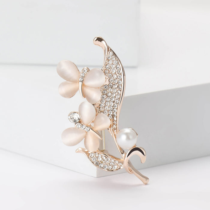 Pearl Floral Spray Brooch With Faceted Crystals And Polished Metal Details