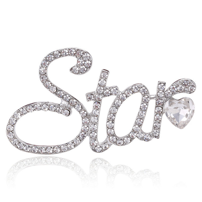 Crystal Star Script Brooch In Gold Or Silver Tone With Polished Metal Detail