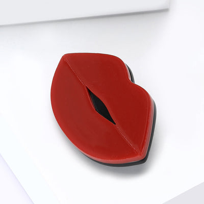 Glossy red lips shown from the front
