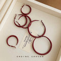 Glossy Burgundy Round Hoop Earrings In Three Graduated Sizes view 3