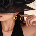 Gold Asymmetric Hammered Oval and Round Hoop Earrings view 4