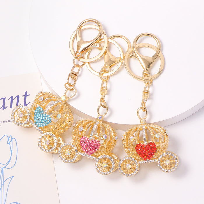 Gold Rhinestone Pumpkin Carriage Keychain Four Hearts