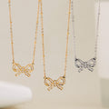 Sacred Heart Multi Charm And Bow Necklace Gold Steel view 3