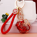 Jeweled Pixiu Keychains in Red Gold and Purple with Fortune Loops view 1