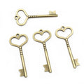 Long Heart Bow Key Pendants in Two Antique Metal Finishes view 2