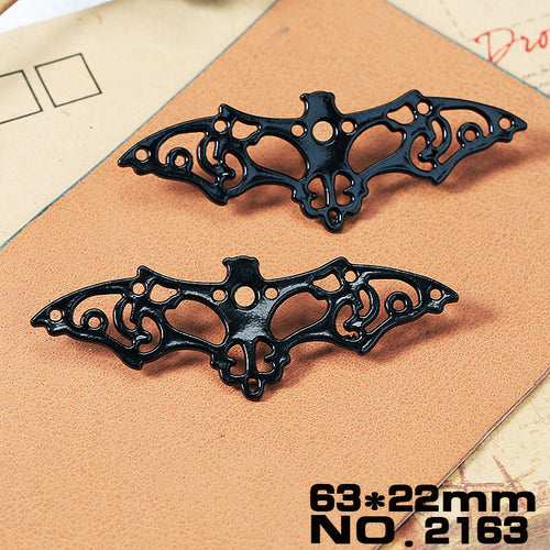 Ten glossy black animal and fantasy-creature charm designs shown in main image 2
