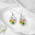 Silver Tone Oval Pressed Flower Drop Earrings in Seven Designs view 5