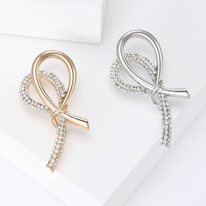 Open Loop Ribbon Brooch With Crystal Strand in Two Finishes