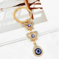 Gold Rhinestone Evil Eye Keychain With Butterfly And Hamsa Charm view 6