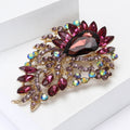 Oval Gem Feather Brooch In Eight Colorways With Polished Metal Detail view 3