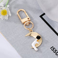 Gold and Silver Tone Assorted Symbol and Character Clip Keychains view 3