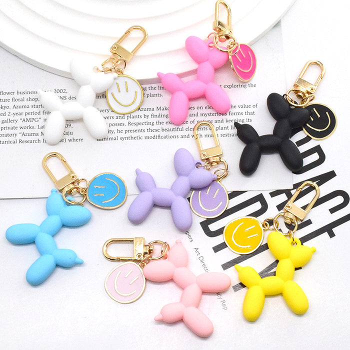 Gold Tone Balloon Dog and Smile Disc Clip Keychains