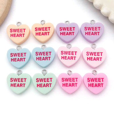 Printed detail graphic for the alphabet letter and heart charms