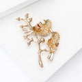 Two Birds On Branch Brooch In Two Colorways With Polished Metal Detail view 4