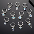 Silver Tone Evil Eye Charm Huggie Hoop Earrings Eleven Styles view 1