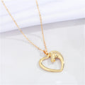 Gold Tone Open Heart and Horse Head Pendant Necklace with Curved Frame view 3