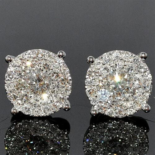 Pair of round clear cluster halo studs on black reflective surface