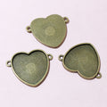Heart Shaped Double Loop Cabochon Connector in Antique Bronze view 2