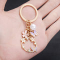 Pink Purple Openwork Butterfly Flower and Pearl Charm Keychain view 3