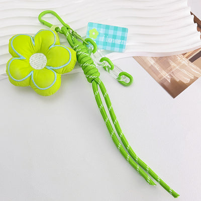 Green padded fabric flower charm with acrylic tag and gold clasp