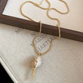 Gold Chain Conch Shell Necklace and Pearl Drop Earrings view 6