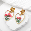 Gold Tone Heart Outline Pressed Flower Resin Drop Earrings view 2