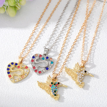 Gold and Silver Tone Crystal Heart and Hummingbird Necklaces