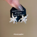 White Crystal Flower Branch Stud Earrings Decorative Jewelry Pair view 1