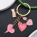 Pink Love Heart Rose and Potion Metal Keychain Set view 3