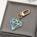 Gold Tone Iridescent Acrylic Heart and Gem Clip Keychains view 9