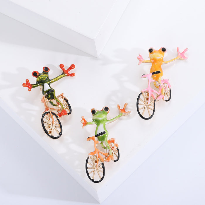 Frog on Bicycle Brooch Orange Pink or Light Green Metal Pin Brooch