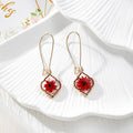 Gold Tone Quatrefoil Pressed Flower Drop Earrings in Six Designs view 6