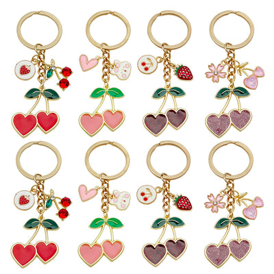 Overview showing the available color and design variations of the pink red and brown cherry heart metal keychain